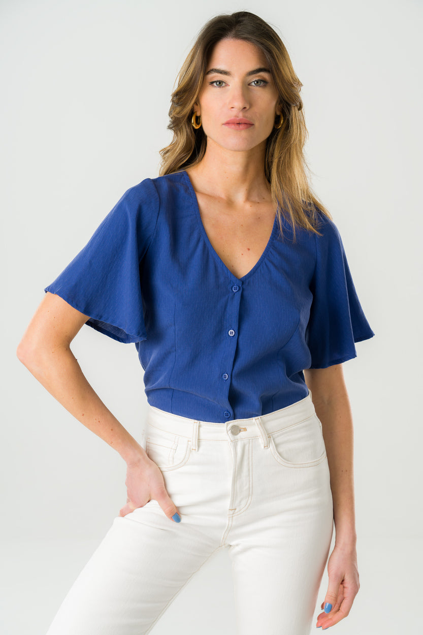 Blouse en Tencel bleu roi, éco-responsable et fabriquée au Portugal, avec manches amples et coupe légère.